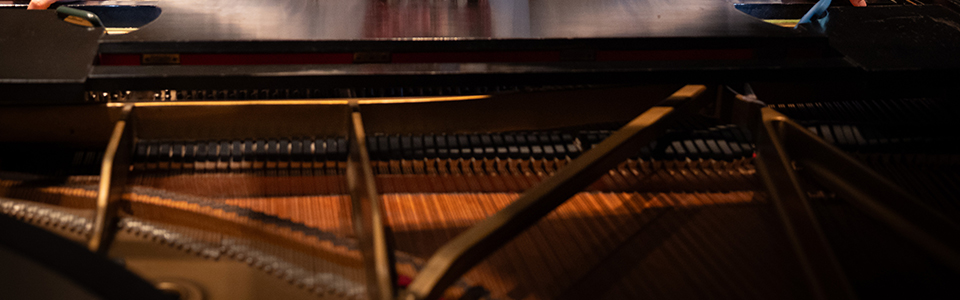 image of student's hands playing piano